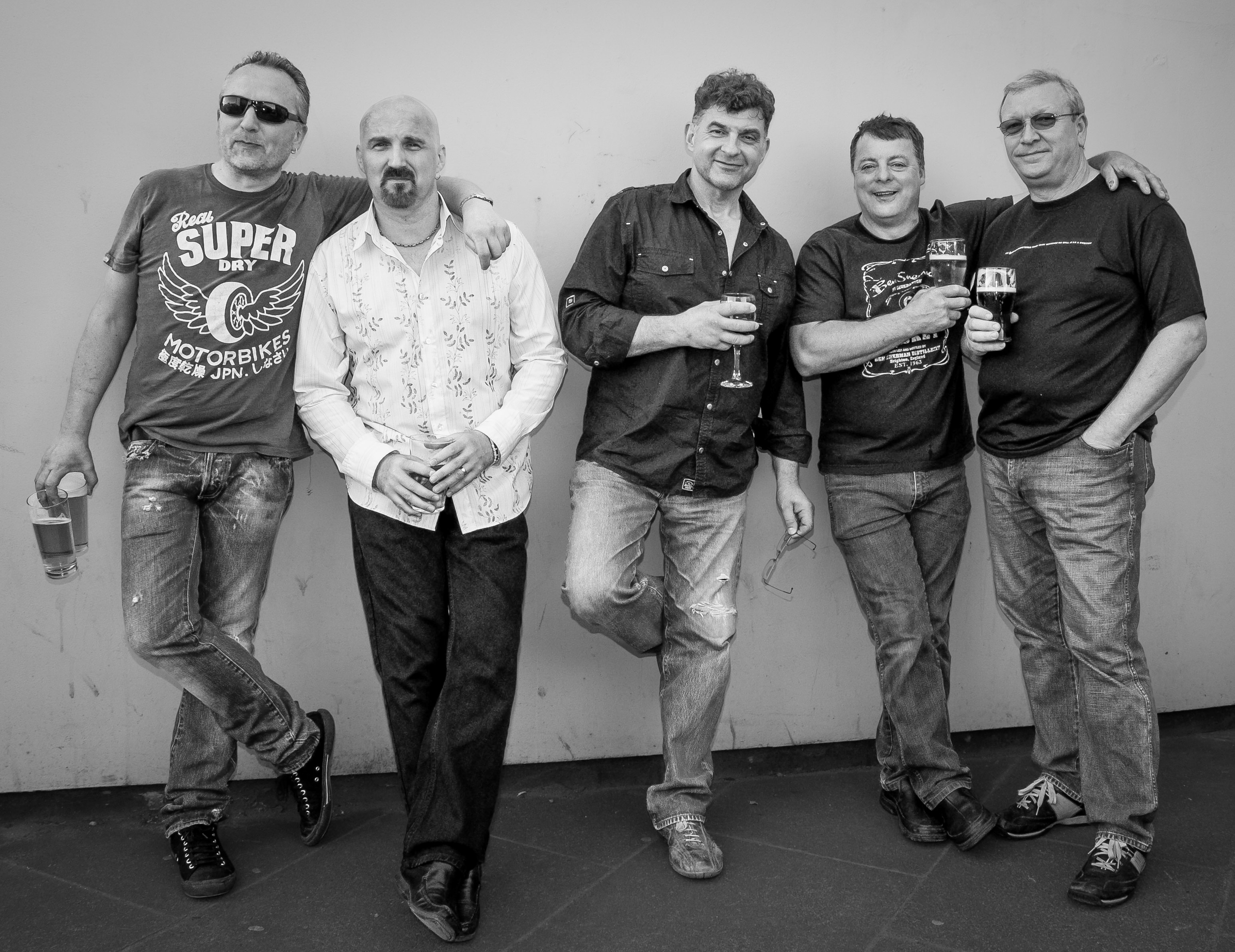 Bad Bob Bates, Bob Davidson, Geordie Waters, Brad Dolphin and Whalebone Pete at Egypt Cottage in a black-and-white group portrait