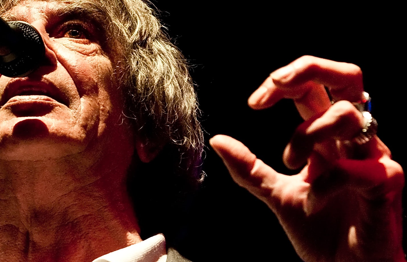 Howard Marks Mr Nice in close-up at a microphone during a live appearance